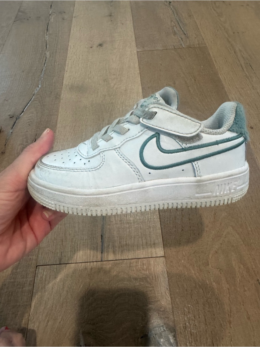 Nike White Sneaker with Teal Accent